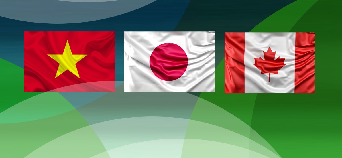 Na zdjęciu widoczne są trzy flagi: Japonii, Wietnamu i Kanady